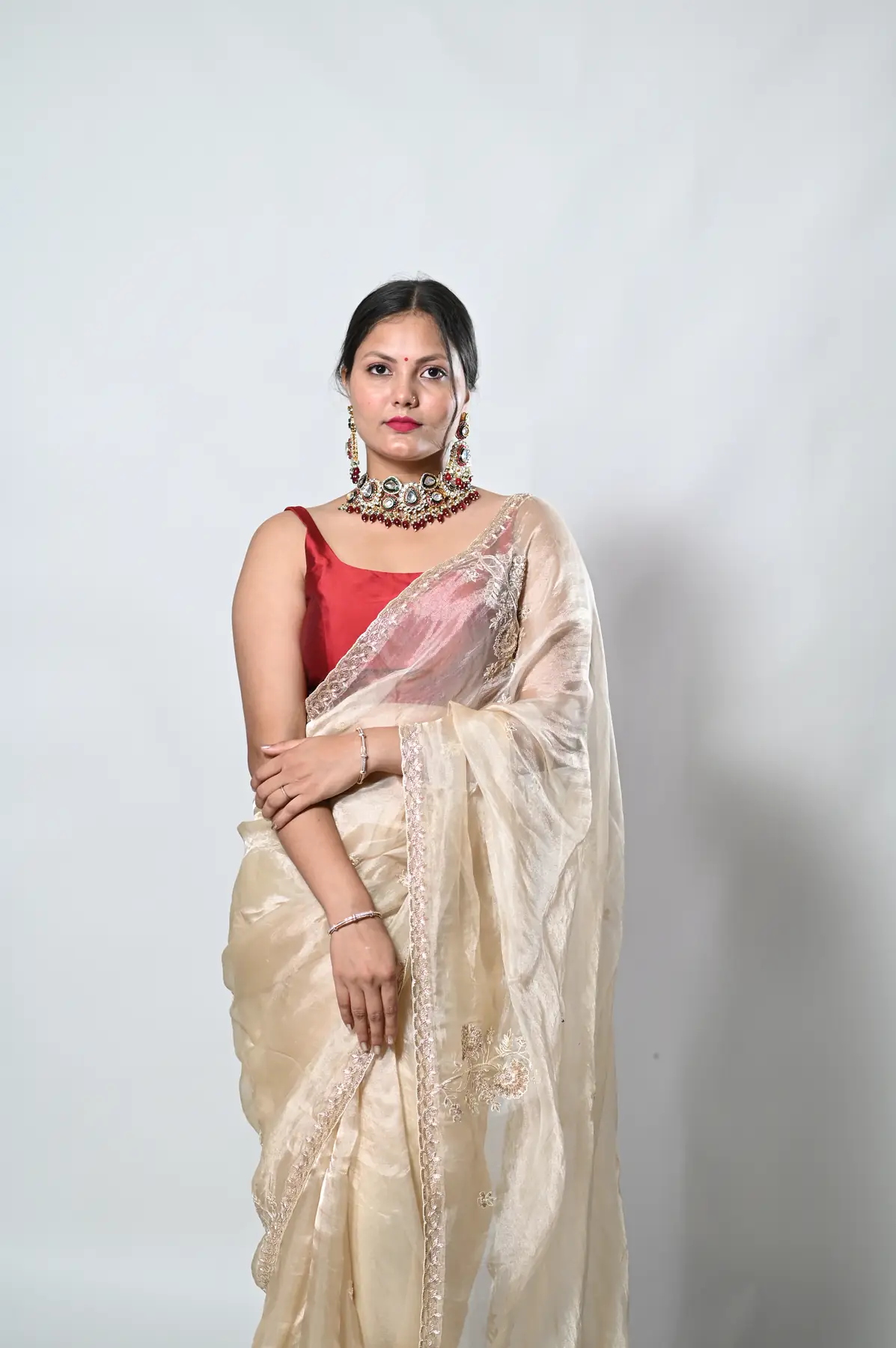 hand embroidery pure tissue golden saree